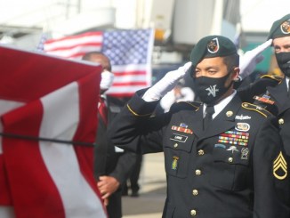 Green Berets, assigned to 5th Special Forces Group (Airborne), conduct a dignified transfer for the final flight of Medal of Honor recipient, Command Sgt. Maj. (Retired) Bennie G. Adkins, to his resting place at Arlington National Cemetery, 14 Dec. Adkins, died due to complications with COVID-19 in April.