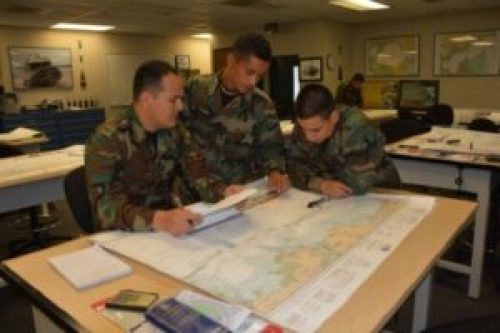 NAVSCIATTS Students in the Patrol Craft Officer - Coastal course conduct classroom navigation exercises. (Photo by Angela Fry, NAVSCIATTS, June 13, 2017).