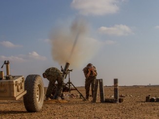 SDF mortar team fires 120mm at ISIS target near Deir ez-Zor in the Middle Euphrates River Valley, Syria. Photo by SGT Matthew Crane, CJTF-OIR, November 16, 2018.