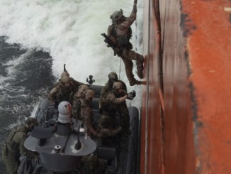 Trojan Footprint UW in Baltic States. U.S. and Danish maritime special operations forces board a ship in the Baltic Sea. Photo by SOCEUR, June 4, 2018.