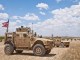US tactical vehicle provides security on roads near Manbij, Syria. Photo by Staff Sgt. Timothy Koster, Combined Joint Task Force - Operation Inherent Resolve, June 20, 2018.