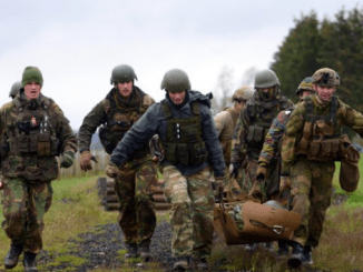 Medics carry simulated wounded during combat lifesaver training at NATO ISTC NSOCM Course (Photo Credit: Jason Johnston).