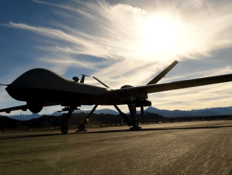 MQ-9 Reaper on flight line at Creech Air Base, Nevada. The RPA can carry four AGM-114 Hellfire missiles and two 500-pound bombs. It can fly for a 18-24 hour mission. (U.S. Air Force photo by Senior Airman Christian Clausen).