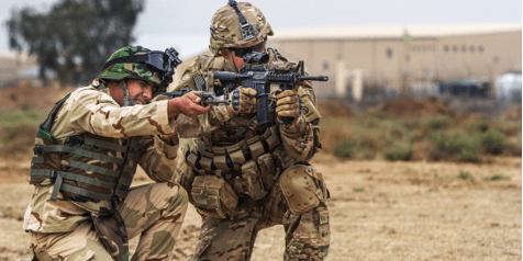 SFABs - Member of 82nd Abn Div trains an Iraqi soldier at Camp Taji, Iraq. (Credit U.S. Army/ SGT Cody Quinn)