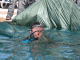 A member of 1/1st Special Forces Group swims out from underneath his parachute canopy in a pool in as part of water jump training. (photo Richard Rzepka - USAG Okinawa).